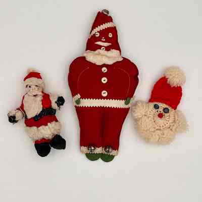 Trio of Cloth Santa Clauses