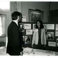 Joyce Zakim and exhibition visitor