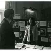 Joyce Zakim and exhibition visitor