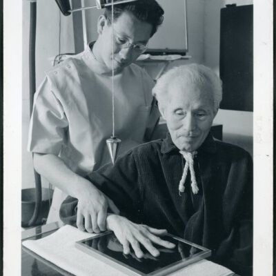 Michael Yonemetsu, [i.e., Yonemitsu] x-ray technician, and Harry Sumida in x-ray room