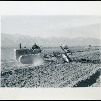 Benji Iguchi driving tractor