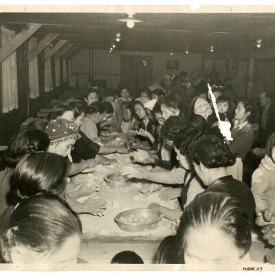 Photograph of making mochi in a mess hall at Manzanar