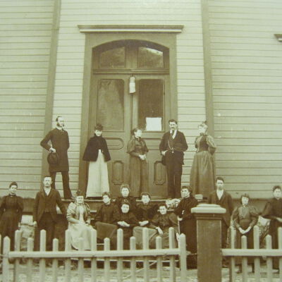The female teacher in the middle may be Mary Austin.