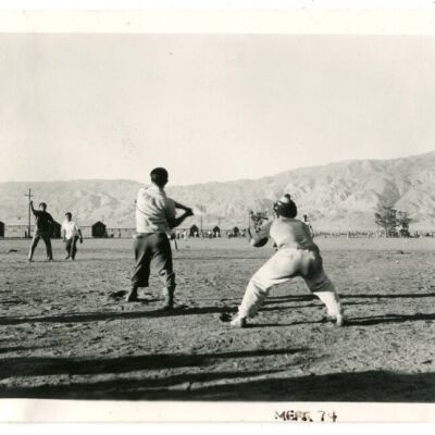 Photograph of boys playing baseball at Manzanar
