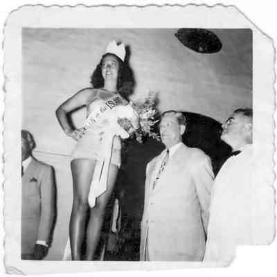 Carol Cahill Queen of the Island 1948 crowned at the Montauk Surf Club, judge Perry Duryea | Cahill, Stayton, and Eurell Families Collection, Montauk Library Archives