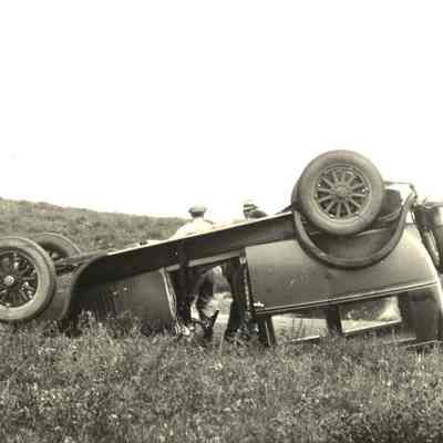 Photograph of an overturned car in Montauk, 1930s