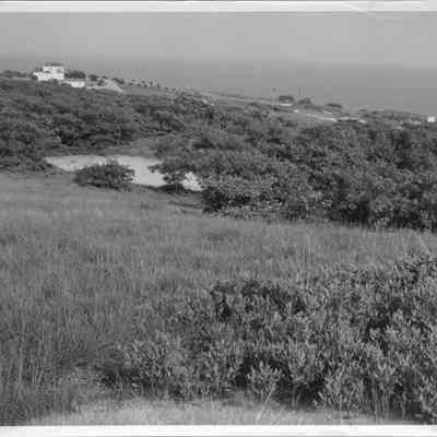 Photograph of Old Montauk Highway from a hilltop looking southeast, circa 1960s.