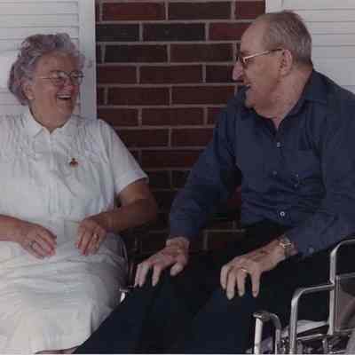 A photo view of two people sitting. 9/20/1989.