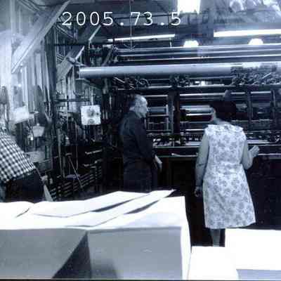 A photo of unidentified mill workers