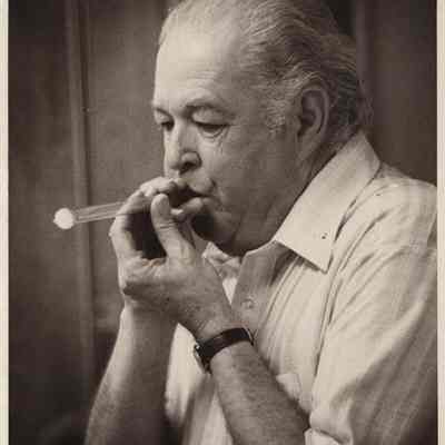 A photo view of Herbert Merrill blowing glass. 4/17/1978.
