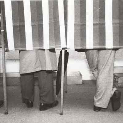 A photo view of voters in the voting booth. 10/4/1992.