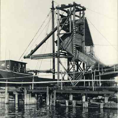 A photo of unloading facilities at a dock.