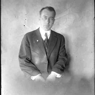 A man in a suit.