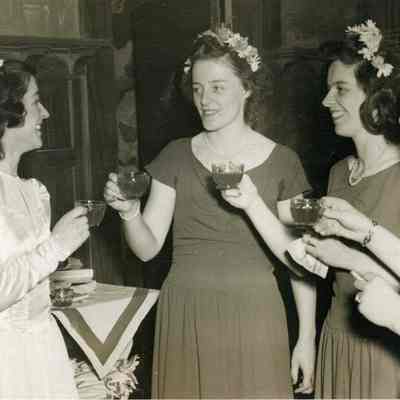 Mrs. John R. Chaisson (Marguerite Martin) receiving toasts