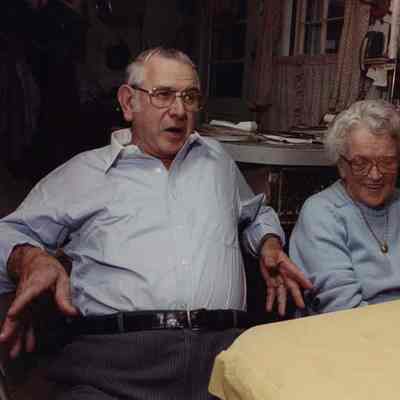 A photo view of a man and a woman. 12/26/1989.