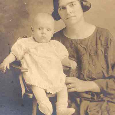 A photo of Mary St. Pierre holding Gerald St. Pierre.