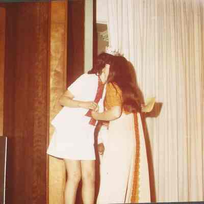 Miss Maine Peggy Welch presenting a special award