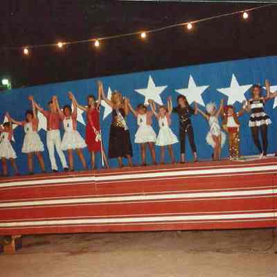 Lisa Kelly and cast doing a closing number