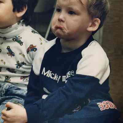 A photo view of a little boy about to cry. 10/18/1988.