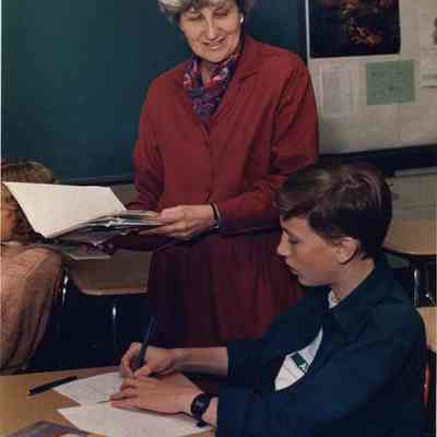 A photo view of a teacher and student. 10/20/1988.