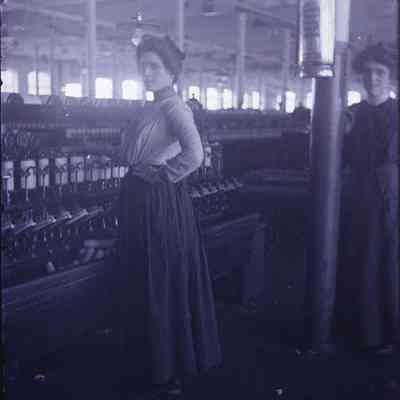 A woman working in a factory.