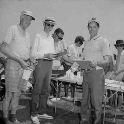A photo view of people at the Interclub Regatta. 7/1980.