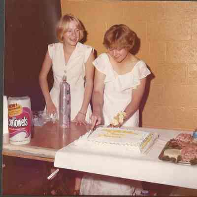 Teen Queen Shannon Crane cutting the cake for the lunch..