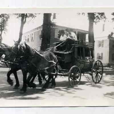 Two Men Riding in a Horse Drawn Carriage in the Brunswick Bicentennial Parade