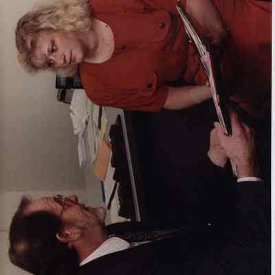 A photo view of a man and a woman. 10/24/1990.
