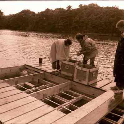 A photo view of three people on a float.