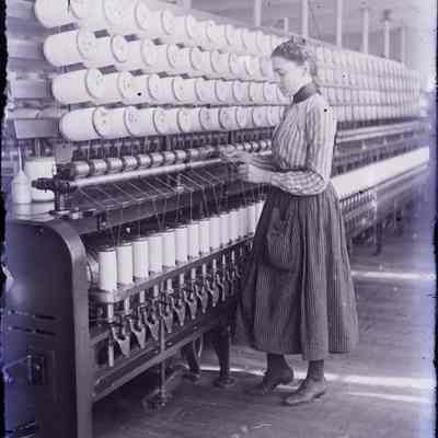 A women working in a factory.
