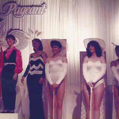 A color photograph of several contestants.
