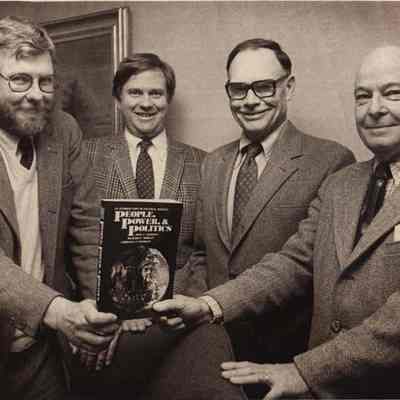 A photo view of four men. 3/2/1981.