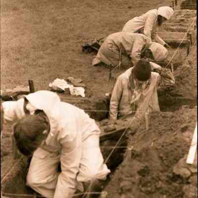 A photo view of students at an archeological dig. 5/1979.