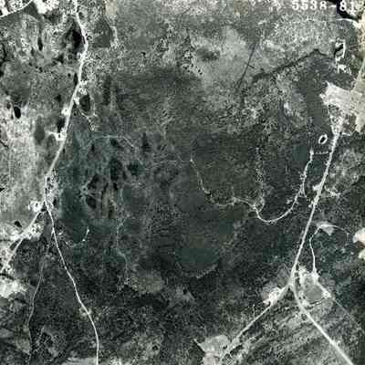 A B/W aerial photograph of an area near the First Parish Cemetery. 5/4/1953.
