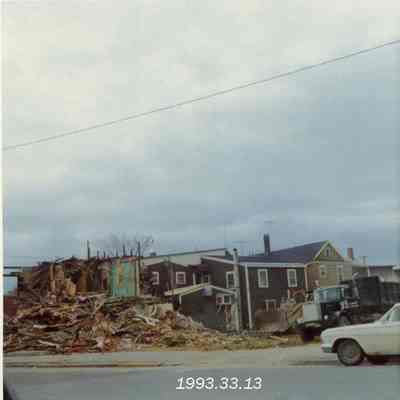 A photo of Mike's Lounge being razed. 3/1973