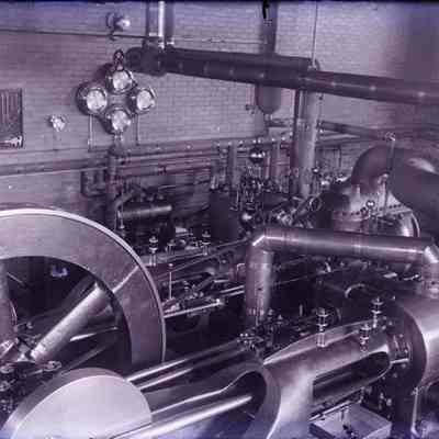 A steam engine in a factory.