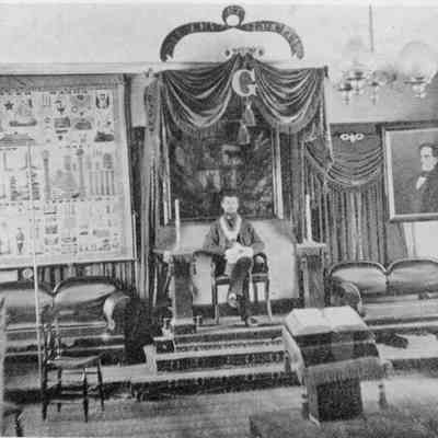 A photo of John Furbish inside a Masonic Hall.