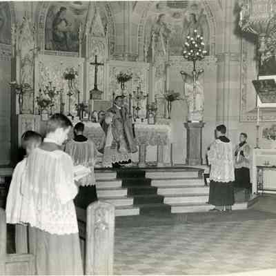 Father Dauphin and Altar Boys