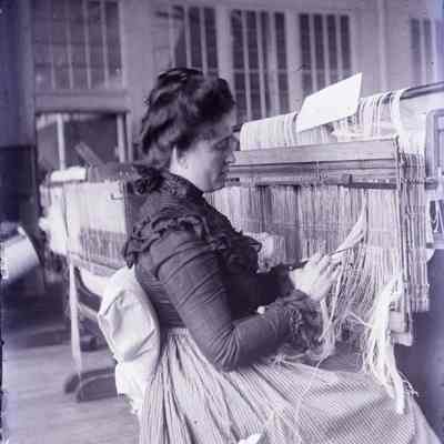 A lady working in a factory.