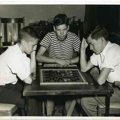 Boys Playing Checkers
