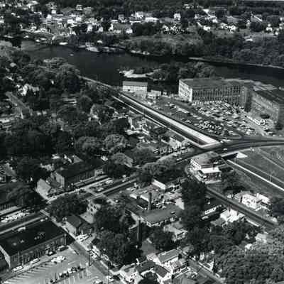 An aerial photo of Maine St. facing Northwest with Androscoggin River at rear. c. 1970