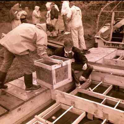 A photo view of people building a float.