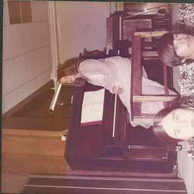 Sharon Hinckley Teen Queen 1968 looking at Fr. Wally