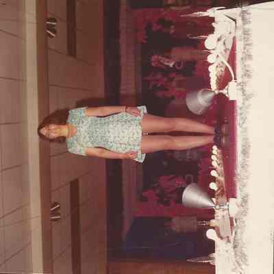 Linda Talbot is 5'6" tall, has brown hair and eyes.