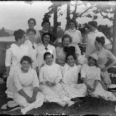 A group of women at the shore.