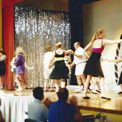 the participants with partners in the opening number