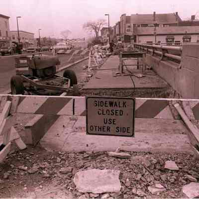 A photo view of sidewalk work. 11/28/1984.