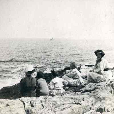 People on the rocks at Bailey's Island