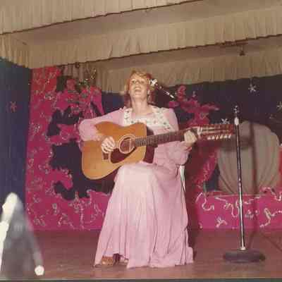 1975 Maine's Jr. Miss Debbie Clark is singing "Killing Me Softly"